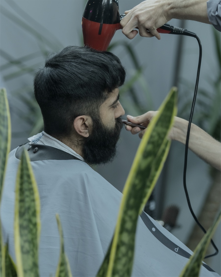 Full beard with a tapered cut